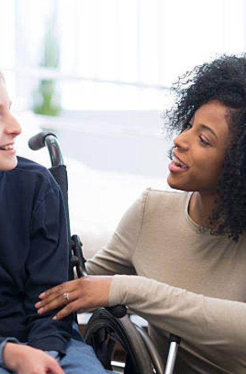 A physical therapist is working with a child in the hospital that has cerebral palsy.